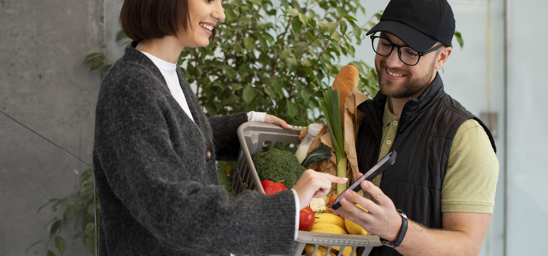 delivery man giving groceries order customer(1)